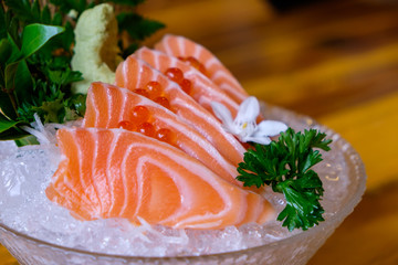 Salmon sashimi served on ice