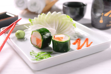 Sushi wrapped with cucumber slices