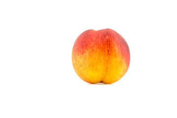 Peach whole close-up isolated on white background