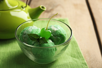 Homemade Green tea ice-cream on dark wooden background