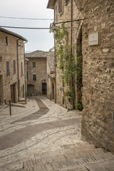 Narrow streets of the medieval village of Spello in Umbria (Italy)