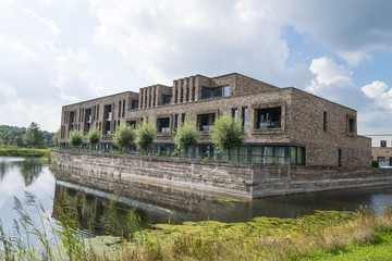 Obraz premium apartment building near water