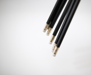 Naklejka premium Black pencil shaft number seven rods