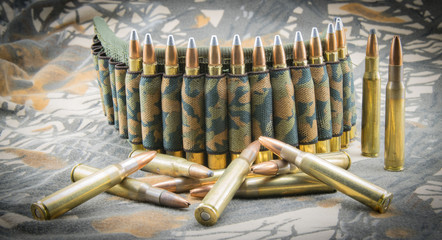 Camouflage ammunition belt.