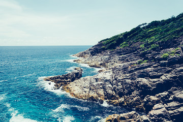 blue sky with sea and rock - film filter
