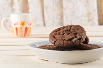 soft dark chocolate brownie cookies on wood
