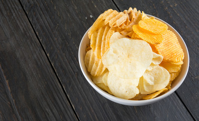 potato chips on wood background