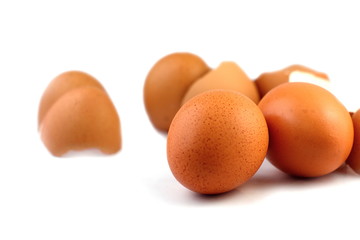 Eggs and eggshell on white background, Select focus on  front egg.