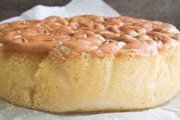 Homemade butter cake with almond stick on top