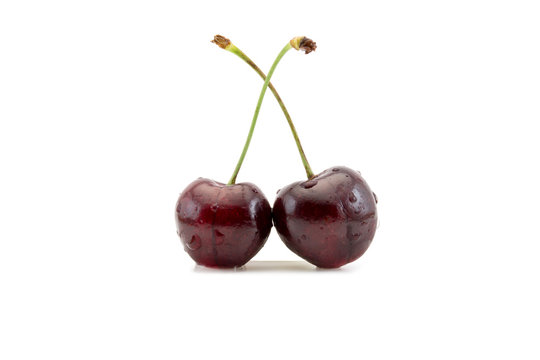 Two cherries isolated on white background
