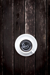 Vintage style Hot black coffee on dark wood background 
