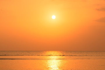 Panoramic golden sunset sky and tropical sea at dusk