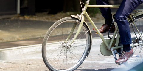 Naklejka premium Riding bike in the city