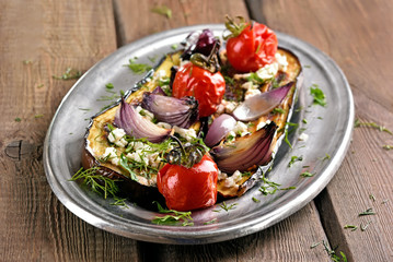 Stuffed eggplant with fried vegetables