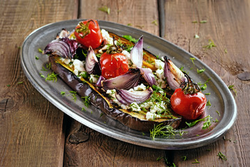 Roasted eggplant on wooden table