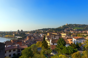 Fototapeta premium Cityscape of Verona - Italy / Panorama of the city of Verona with the Adige river seen from the hill. Verona (UNESCO world heritage site) - Veneto, Italy