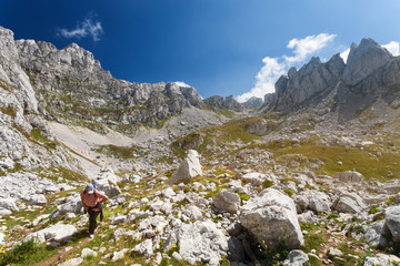 Fototapeta premium Hiking in the mountains at sunny day