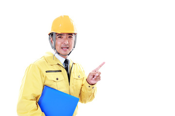 指示する笑顔の労働者