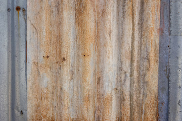 Obraz premium Wall and roof of galvanized rusty old