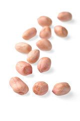 Obraz premium raw peanut kernel on white, (large depth of field, taken with tilt shift lens)