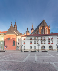 Small Market Square in Krakow, Poland, with St Mary's church and St Barbara's church