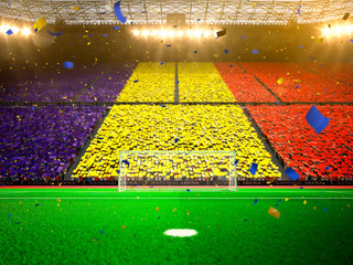 Flag Romania  of fans. Evening stadium arena © Anna Stakhiv
