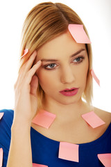 Woman with sticky notes.