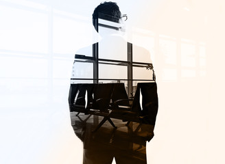 Double exposure portrait of thinking businessman and airport terminal. Concept of business trip and flight. 
