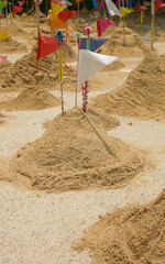 Fototapeta na wymiar Thai people make sand moutain on buddhist day 