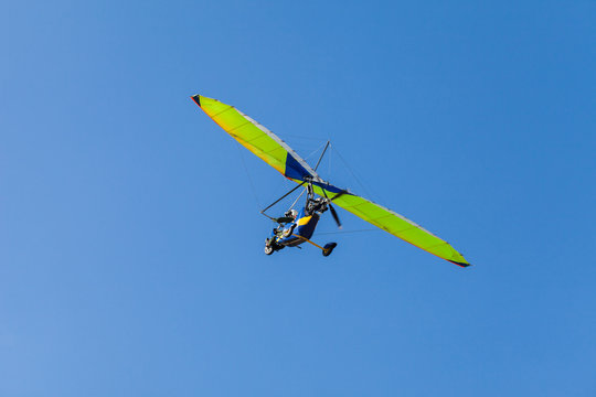 The motorized hang glider over the ground