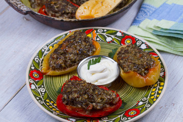 Baked Stuffed Peppers with Meat, Wild Rice, Vegetables and Greens
