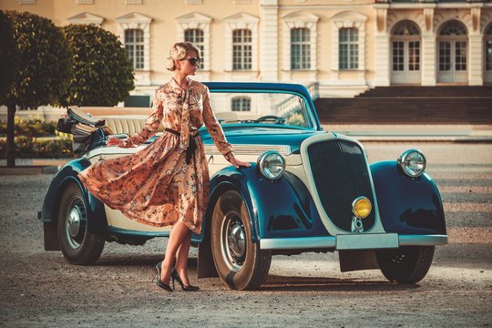 Beautiful Lady Near Classic Convertible