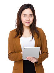 Asian Young businesswoman use of the tablet pc