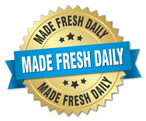 made fresh daily 3d gold badge with blue ribbon