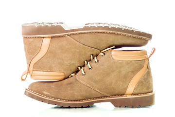 Brown man's fashion shoes isolated on white background