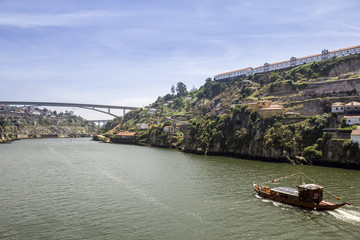Porto landscape view over Douro River and tradicional Rabelo boats