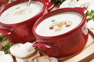Creamy mushroom soup with mushrooms, selective focus