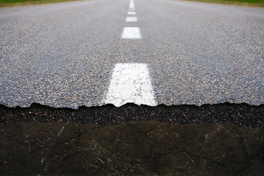 Damaged asphalt road