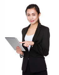 Asian young businesswoman use of the tablet pc