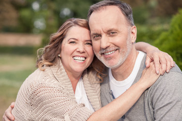 Fototapeta premium Cheerful senior married couple loves each other