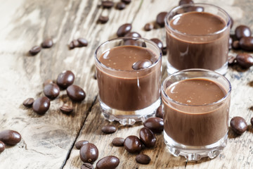 Chocolate and coffee dessert and sweets and coffee beans on the
