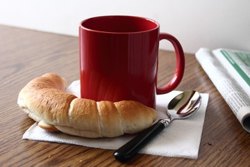 Retro breakfast.Cup of coffee, with some fresh bread.