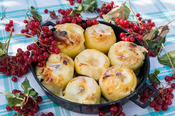 Appetizing baked apples with fresh Kalina