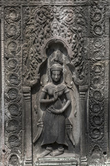 Obraz premium Apsara carvings status on the wall of Angkor temple, world herit
