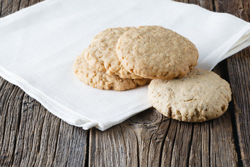 Oat cookies on rustic wooden table