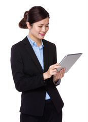 Asian young businesswoman use of the tablet pc