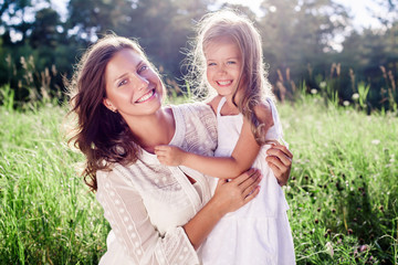 Happy Family outdoor. Mother and daughter