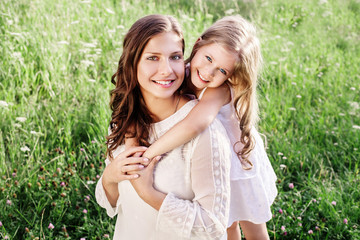 Naklejka premium Happy Family outdoor. Mother and daughter