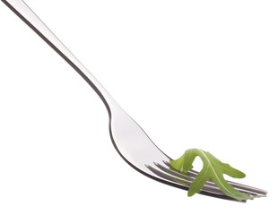 Fresh rucola  salad on fork isolated on white background cutout.