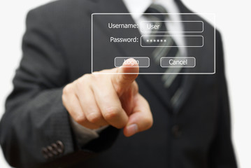 businessman pressing authentication button on login display